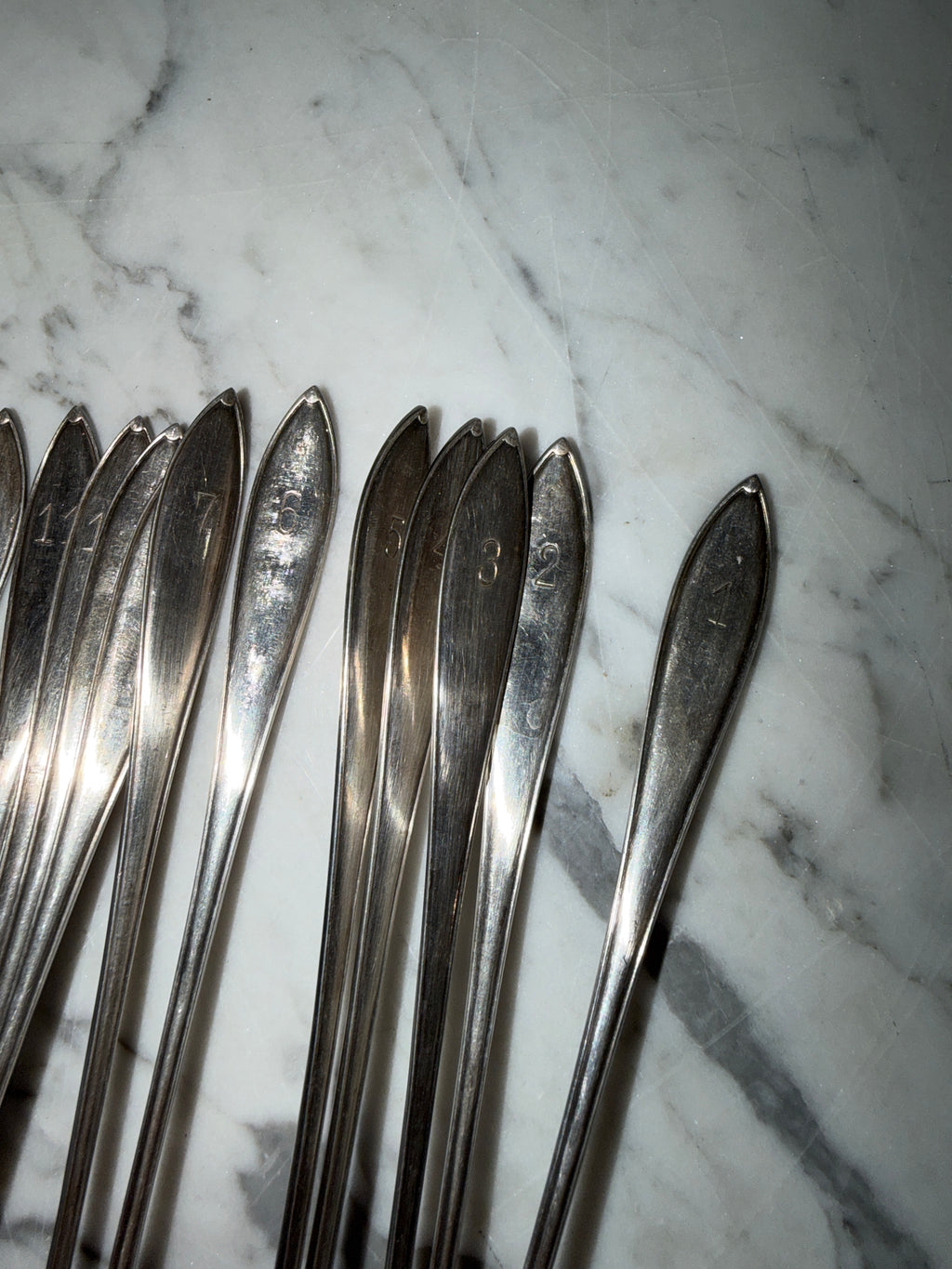 A set of 12 dessert/cocktail spoons