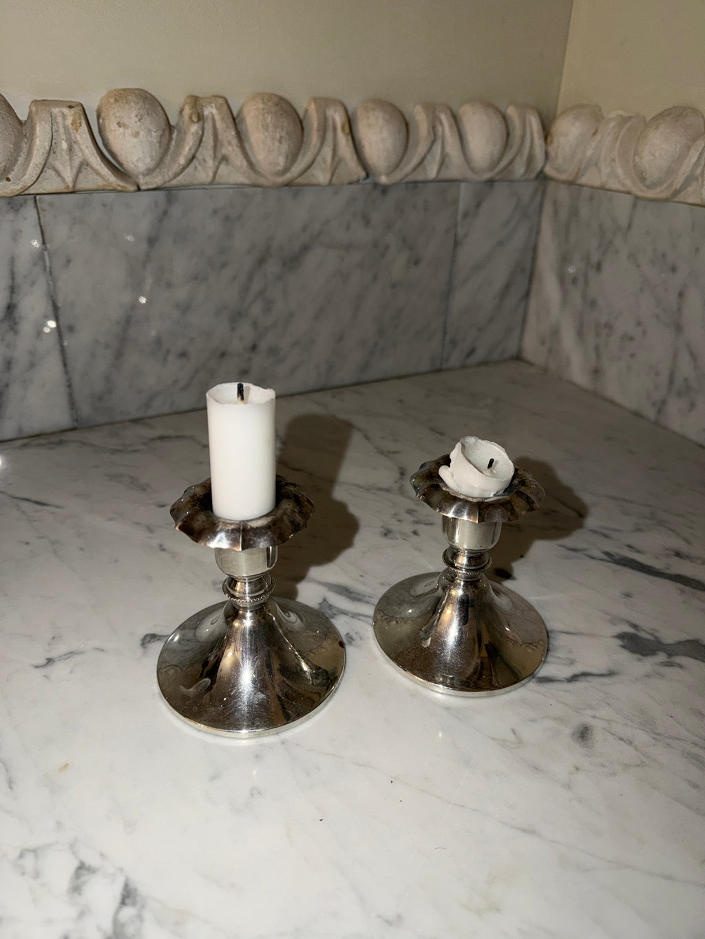 A pair of silver candlesticks