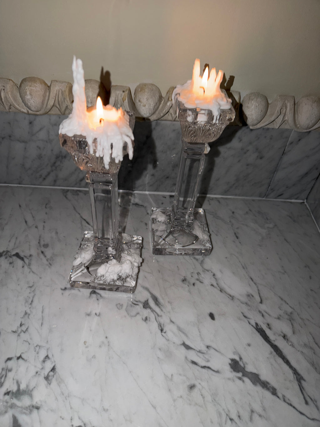 A pair of crystal candlesticks