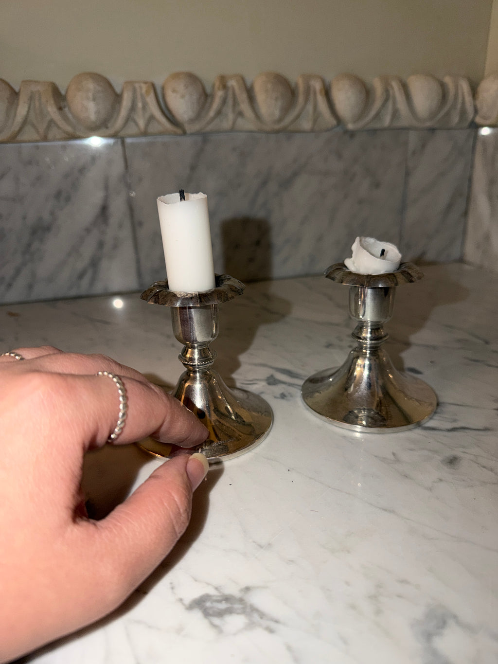 A pair of silver candlesticks