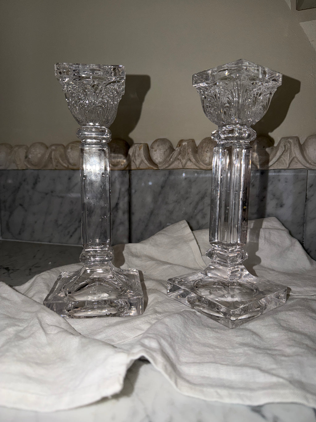 A pair of crystal candlesticks