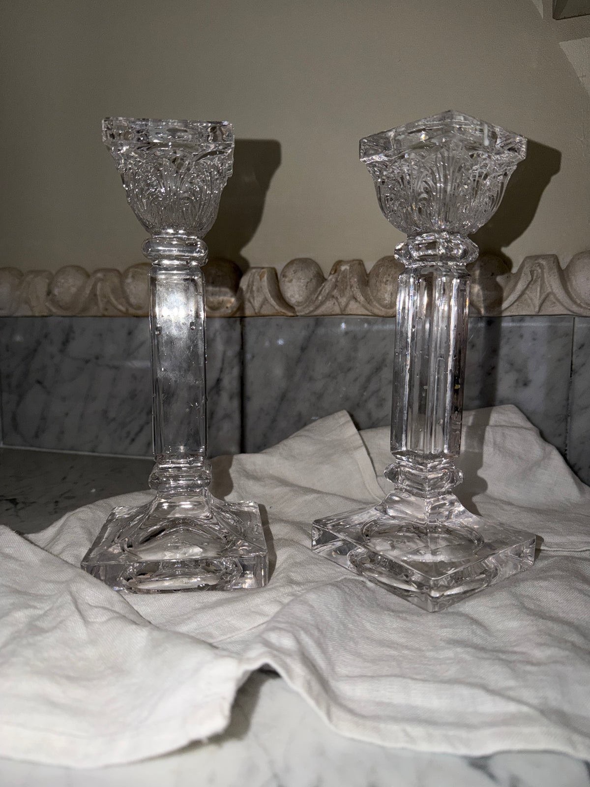 A pair of crystal candlesticks