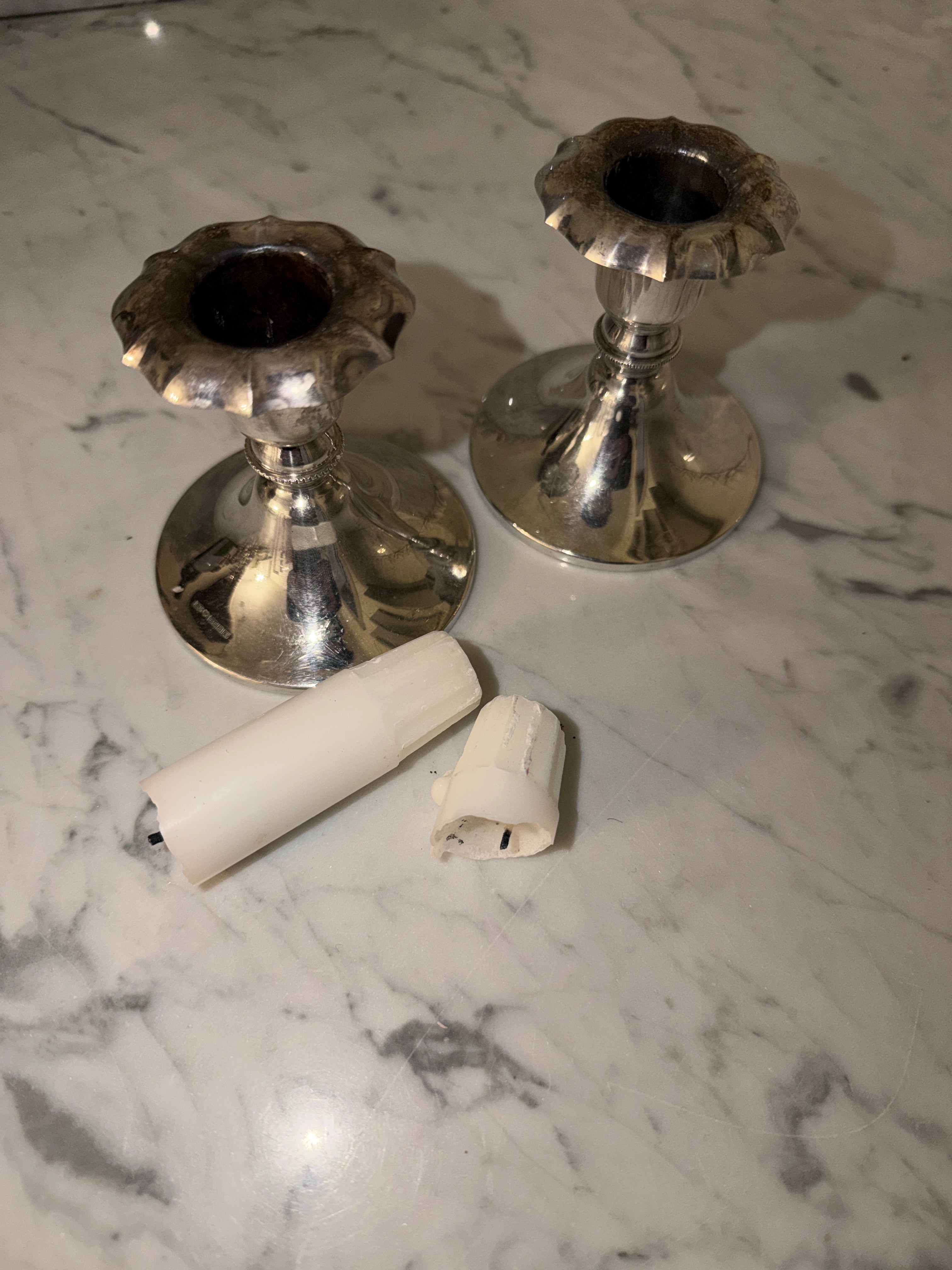 A pair of silver candlesticks