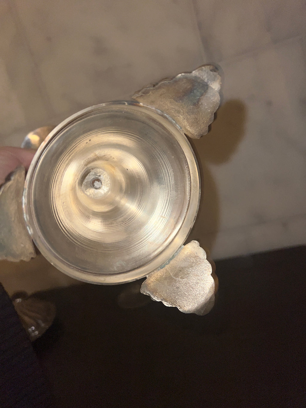 A tall vintage candle stick