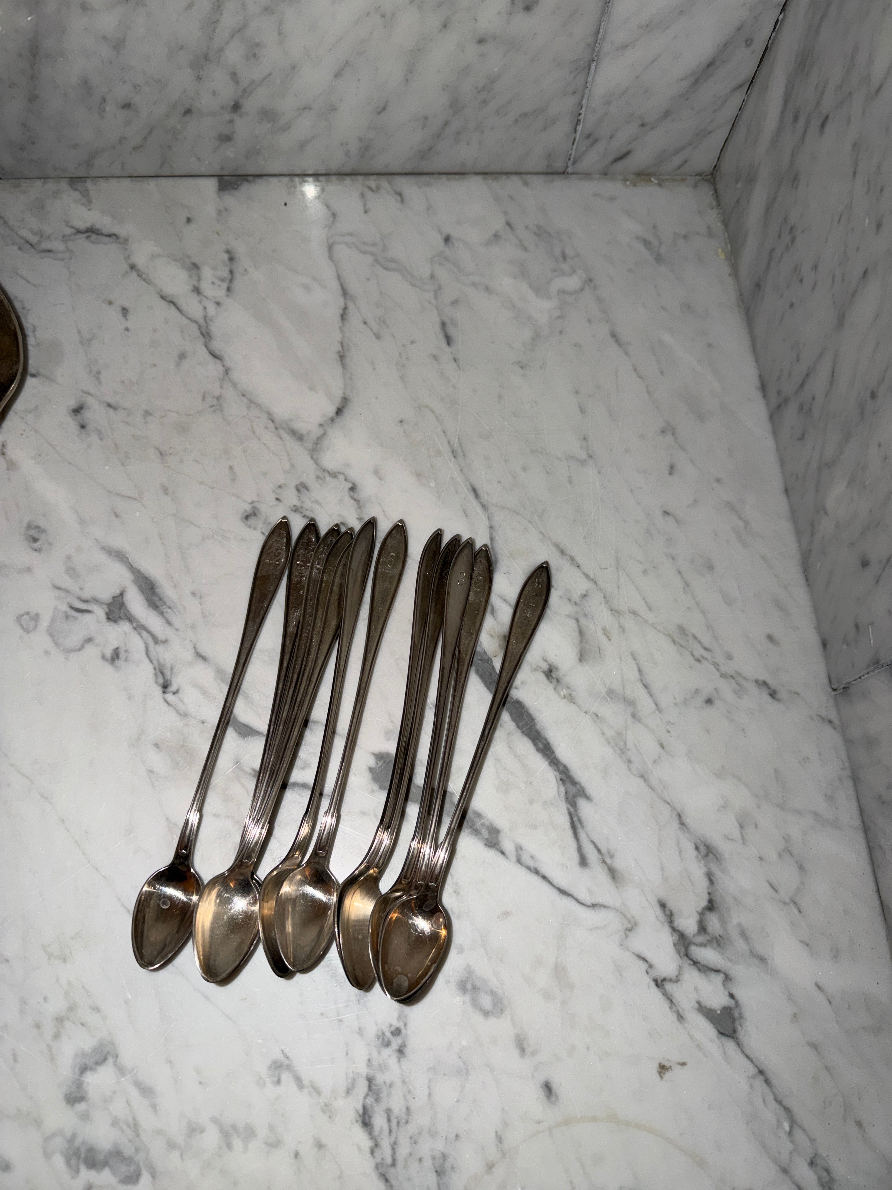 A set of 12 dessert/cocktail spoons